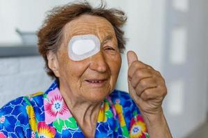 bandage on eye of a senior person photo