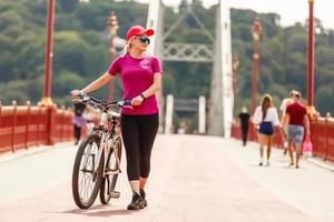 woman on bike on a summer day photo