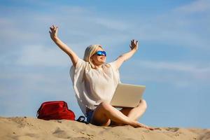 Freelancer Woman Work on Laptop in Desert photo