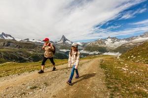 Amazing view of touristic trail near the Matterhorn in the Swiss Alps. photo