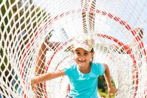 Active little girl on playground photo