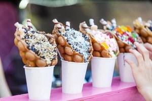 vanilla ice cream bubble waffle with fruit and sweets photo