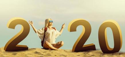 stylish beautiful smiling cheerful woman happy in desert sand dressed, travel safari on vacation, sunny summer day Happy New Year 2020 Numbers At Sunrise photo