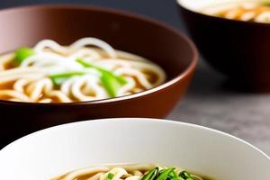 Delicious noodles. Fast food meal with appetizing pasta and chopsticks. photo