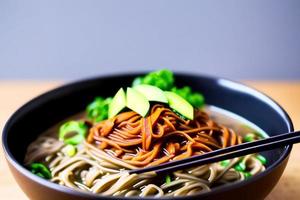 Delicious noodles. Fast food meal with appetizing pasta and chopsticks. photo