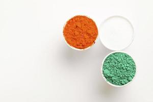 Concept for Indian Independence day and republic day, Three color in cup on white background photo