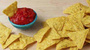 Tortilla chips with spicy tomato salsa video
