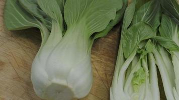 Endives on a wooden cutting board Cichorium intybus. Fresh chicories video
