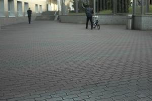Area in city. Tile on road. Tile coating of area. photo