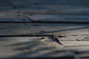 Wooden balcony with sunlight in the back in the morning, deep off-field, wood texture, brown wooden balcony. photo