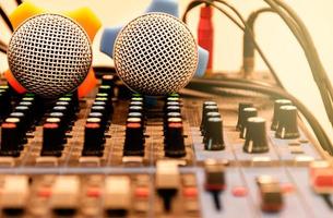 Two microphone on console sound board mixer photo