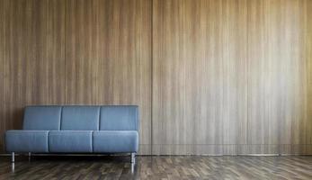 Blue sofa on left of room decorated with wall and wood floor photo