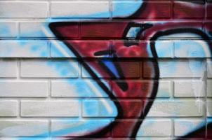 Background image of the wall decorated with colorful abstract graffiti. Street art concept photo