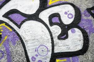 textura de un fragmento de la pared con pintura de graffiti, que se representa en él. una imagen de un dibujo de graffiti como una foto sobre temas de arte callejero y cultura de graffiti