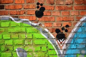 Background image of the wall decorated with colorful abstract graffiti. Street art concept photo