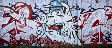 The texture of the wall with graffiti, which is depicted on it. The image of the whole and complete graffiti of the drawing as a resource for the design of 3D projects photo