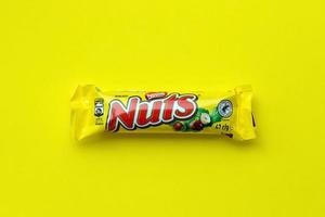 KYIV, UKRAINE - MAY 4, 2022 Nuts original chocolate bar manufactured by Nestle company photo