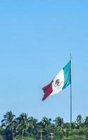 Mexican green white red flag in Zicatela Puerto Escondido Mexico. photo