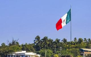 Mexican green white red flag in Zicatela Puerto Escondido Mexico. photo