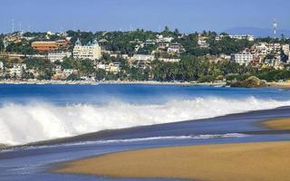 Puerto Escondido Oaxaca Mexico 2022 Extremely huge big surfer waves at beach Puerto Escondido Mexico. photo