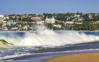 Puerto Escondido Oaxaca Mexico 2022 Extremely huge big surfer waves at beach Puerto Escondido Mexico. photo