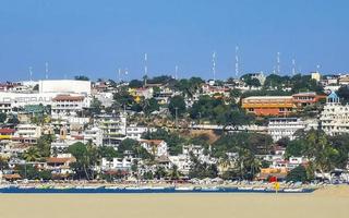 Puerto Escondido Oaxaca Mexico 2022 Beach sand blue water huge surfer waves Puerto Escondido Mexico. photo