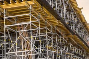 Construction formwork for a casting of monolithic concrete structures and scaffolding. photo