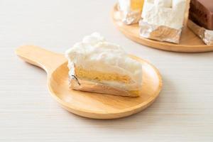 coconut cake on wood plate photo