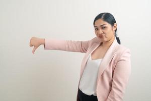 Asian woman with bad mood and bad hand sign photo