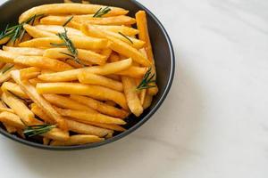 French fries with sour cream and ketchup photo