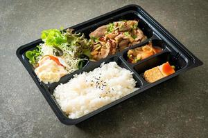 Japanese rice with pork yaki bento set photo