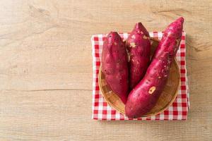 Japanese sweet potatoes on basket photo