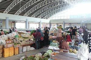 SOLO, INDONESIA, 2022 - Traditional market scene during the day photo