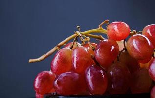 Bunch of ripe red grapes close up. photo