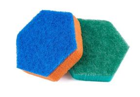 Hexagonal dishwashing sponge isolated on white background. Household sponge. photo