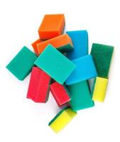 Several multi-colored sponges isolated on a white background. Sponge for washing dishes . photo