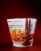 KRASNOYARSK, RUSSIA - OCTOBER 10, 2022 Fast food in box. Funchoza with Thai sauce. Thai food. photo