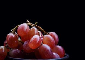 Bunch of ripe red grapes close up. photo