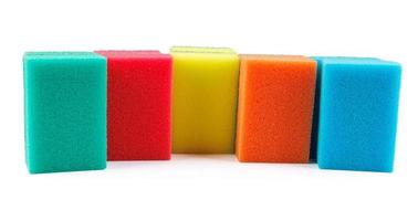 Several multi-colored sponges isolated on a white background. Sponge for washing dishes . photo