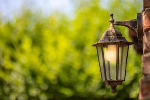 Outdoor lamp, wall lamp with textured background photo