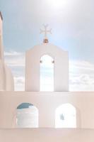 Aegean sea Santorini island archipelago cyclades greece europe religion Christian. Beautiful sunset view of white church photo