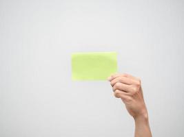 Hand hold post it white isolated photo