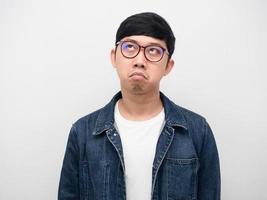 Man jeans shirt wearing glasses bored emotion gesture looking up portrait photo