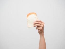 Man hand holding bread isolated photo