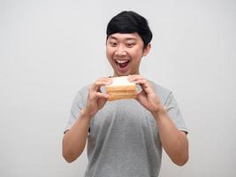 Asian young man very hungry eatting sandwich portrait photo