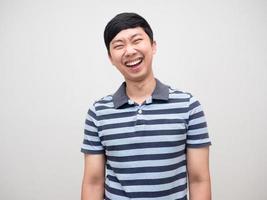 Young man striped shirt happy laugh isolated photo