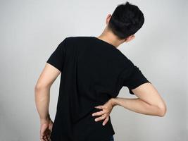 Back side of man pain his waist isolated photo