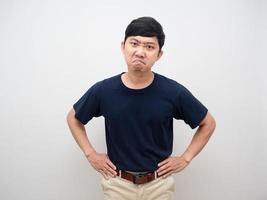 Asian man angry emotion hand waist isolated photo