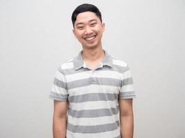 Positive man striped shirt happy smile isolated photo