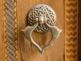 Old Handmade ottoman metal door handle photo